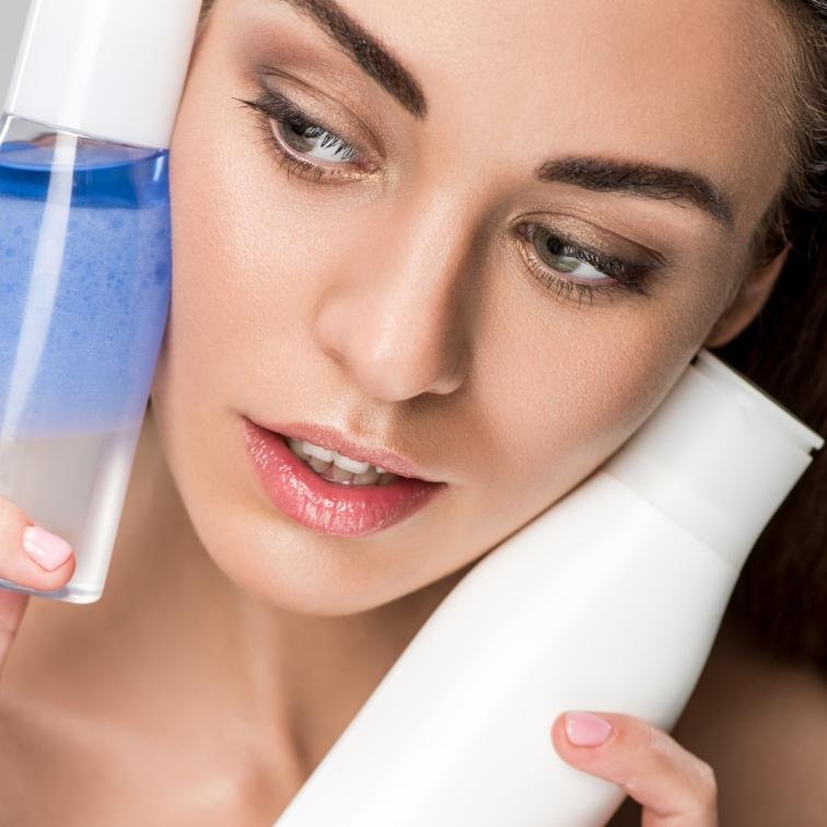woman holding beauty products